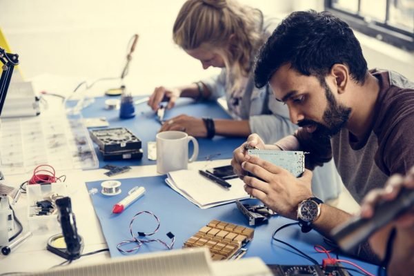 electronics-technicians-team-working-on-computer-parts.jpg